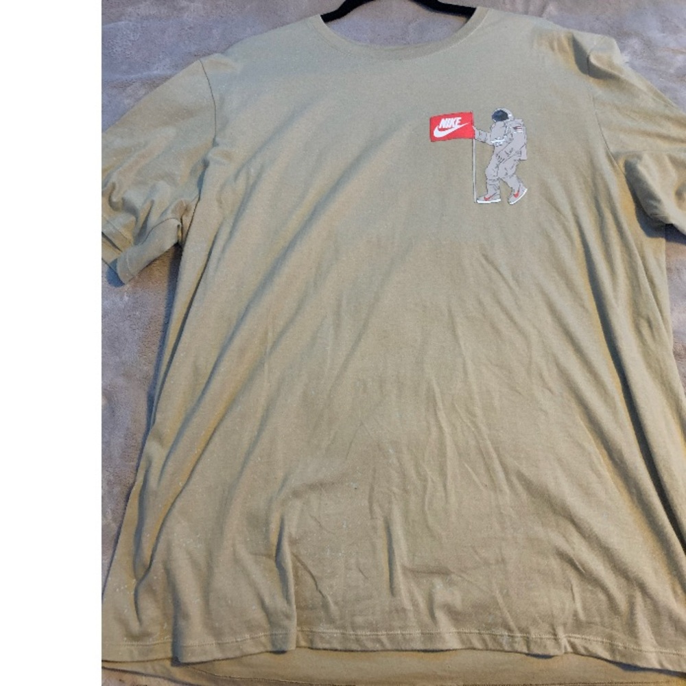A beige nike shirt